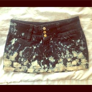 Bleach stained black denim mini skirt
